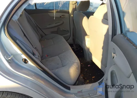 2009 Toyota Corolla from USA, damaged, VIN 1NXBU40E99Z103127